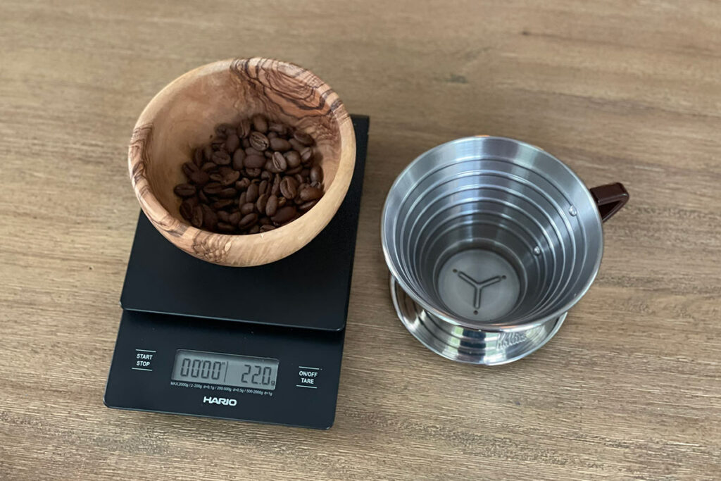 Kalita 185 brewer with coffee beans
