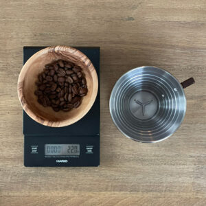 Kalita 185 brewer with coffee beans