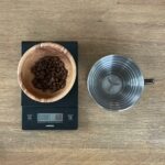 Bowl with coffee beans and Kalita 185 brewer