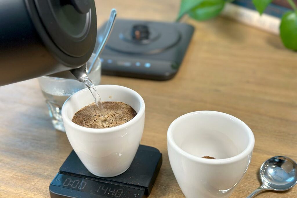 The SAKI Luna Electric kettle with coffee cupping cups